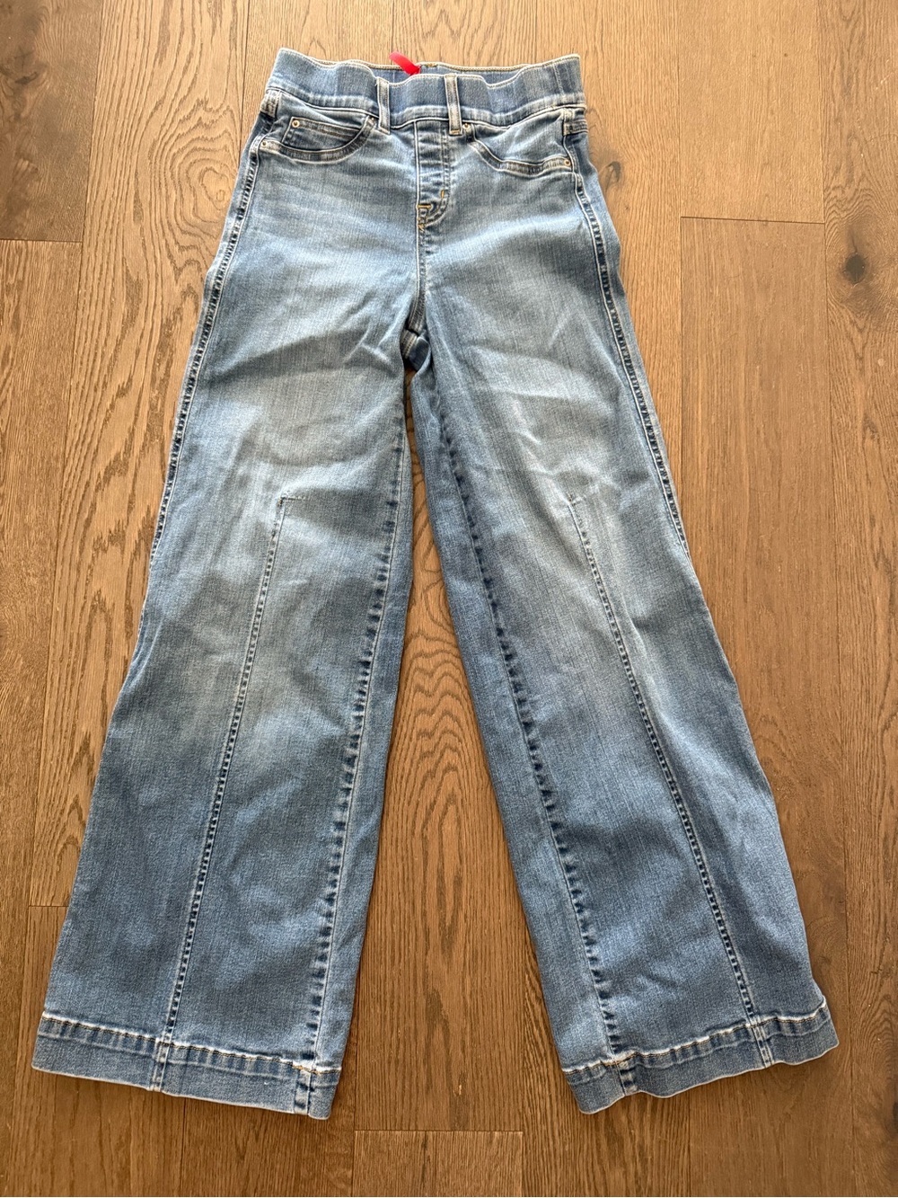 Spanx Women's Seamed Front Wide Leg Jeans in a light blue denim wash